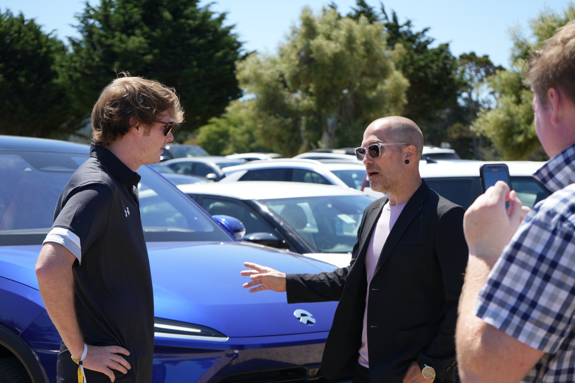 Colin Phipps and Dan Mac in front of NIO EC6