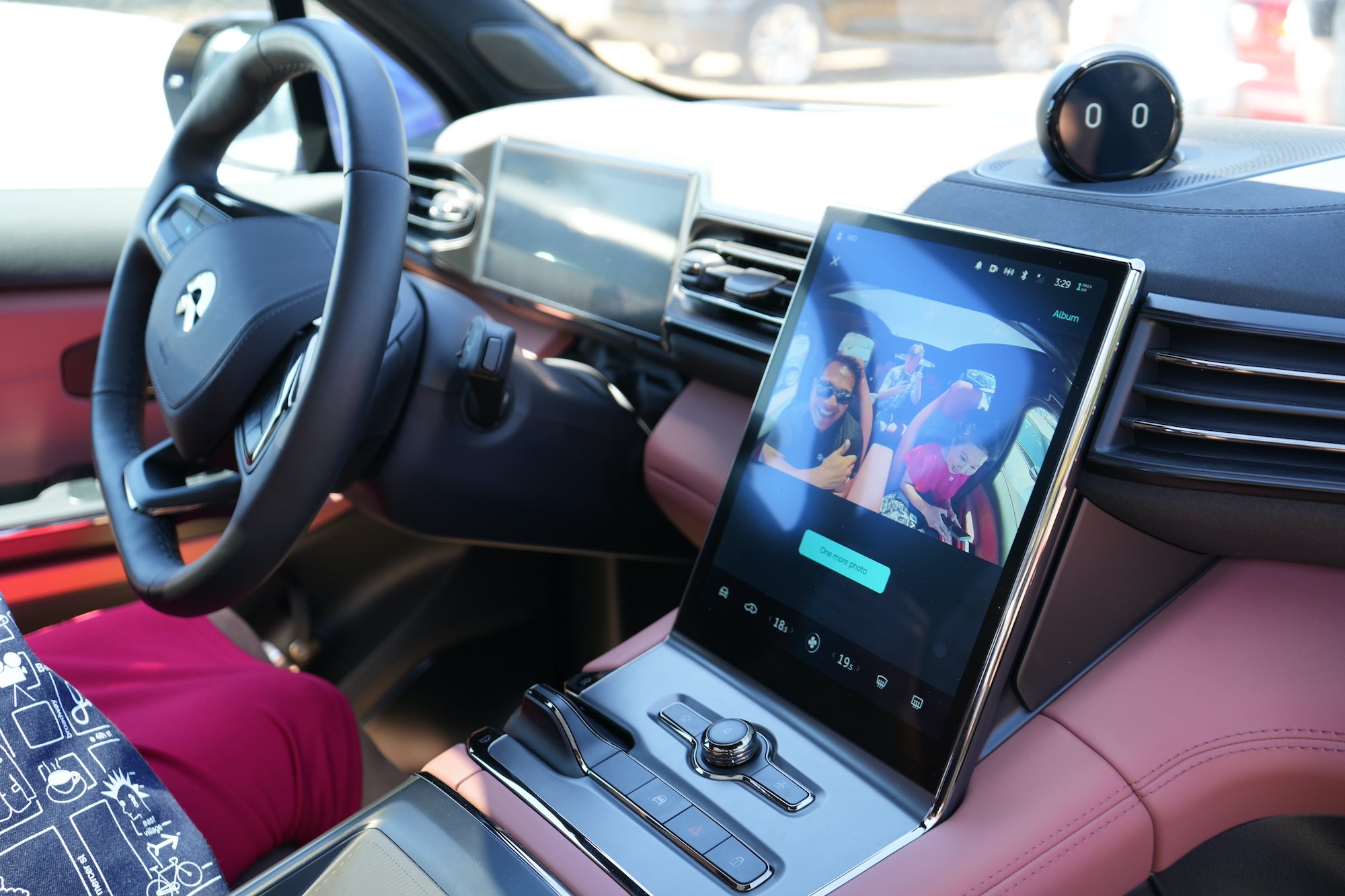 NIO's NOMI taking a selfie inside the NIO EC6